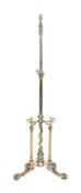 A gilt metal and composition adjustable standard lamp in Roman Revival taste