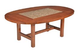 A walnut and granite inset dining table