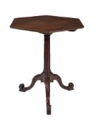 A mahogany hexagonal tripod occasional table