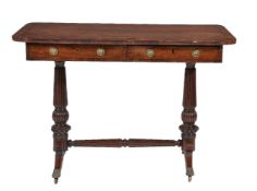 ϒ A Regency rosewood and simulated rosewood library table