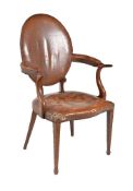 A mahogany, boxwood strung, and leather upholstered open armchair