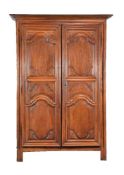 A Louis XV walnut armoire