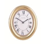 Cartier, a gilt metal travel alarm clock