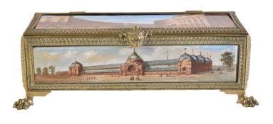 A gilt brass and painted pottery mounted casket