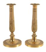 A pair of French gilt bronze candlesticks in Louis Philippe taste