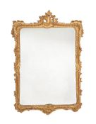 A pair of carved giltwood wall mirrors in Louis XV style