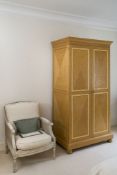 David Linley, An oak, brown oak, and ripple sycamore wardrobe