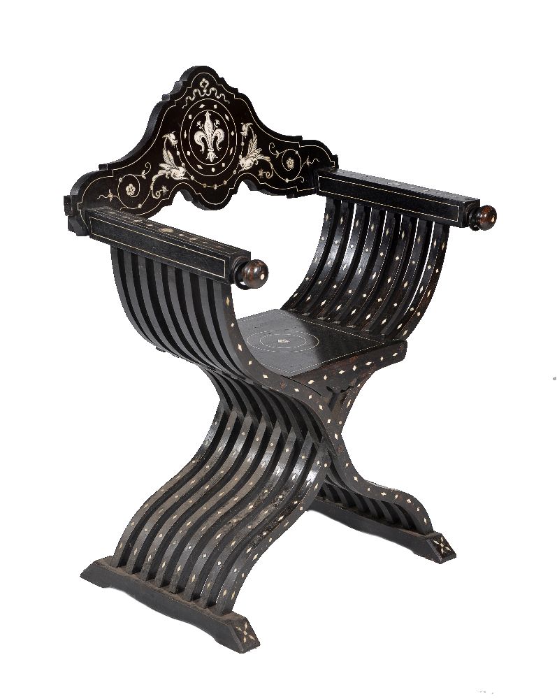 ϒ An Italian Florentine ebony and ivory inlaid x-frame chair