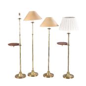 A pair of brass and stained hardwood standard lamps