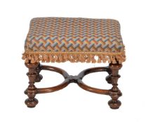 A Queen Anne walnut footstool