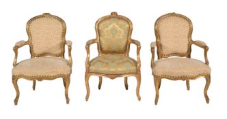 A pair of giltwood and upholstered armchairs in Louis XV style