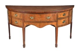 A George III mahogany and inlaid sideboard