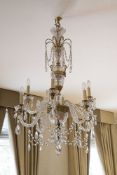 A pair of cut glass and gilt metal mounted eight light chandeliers in late 18th century taste