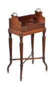 A mahogany book stand or cheveret table