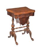 A Victorian walnut games and work table