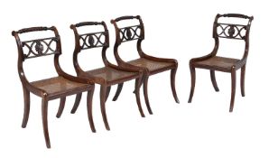 A set of four Regency mahogany side chairs