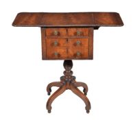 ϒ A Regency mahogany and ebony strung work table