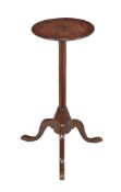 A mahogany and fruitwood tripod candle stand