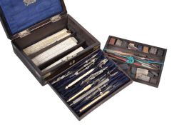 ϒ A rosewood and brass bound cased composite set of drawing and painting instruments