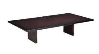 A rectangular stained wood coffee table