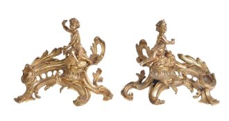 A pair of gilt bronze figural chenets in Louis XV taste