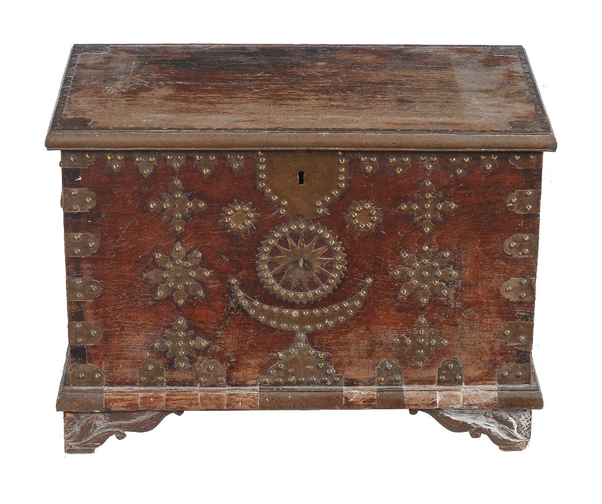 A hardwood and brass studded chest
