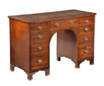 A mahogany kneehole desk