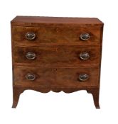 ϒ A George III bowfront mahogany chest of drawers