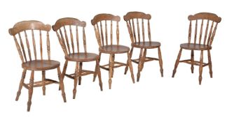 A set of seven elm kitchen chairs