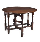 An oak gateleg table