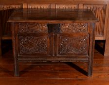 A Charles II oak chest