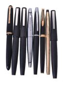 A collection of eight pens