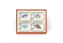 Hermès, a set four rectangular porcelain ashtrays