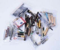 A collection of spare parts for fountain pens, ball point pens and roller ball pens