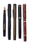 A collection of five Swan fountain pens