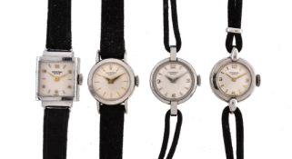 Four lady's Universal stainless steel wristwatches