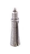 A silver novelty lighthouse combination pencil, penknife and button hook