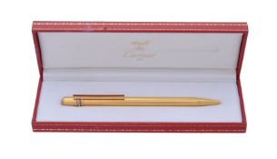 Cartier, Must de Cartier, a gilt metal ball point pen