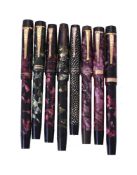 A collection of eight Onoto marbled fountain pens