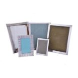 Five silver coloured rectangular photograph frames by Tiffany & Co.