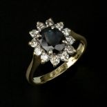 A sapphire and diamond cluster ring