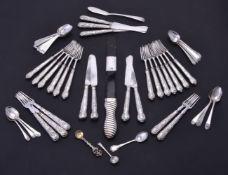 ϒ A set of four George IV silver handled dessert knives and thirteen forks by Aaron Hadfield