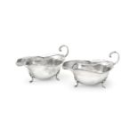 A pair of silver oval sauce boats by Sucking Ltd