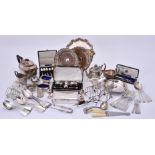 A collection of silver flatware and plated items