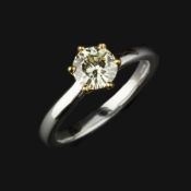 A diamond single stone ring