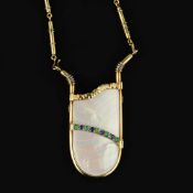 An 18 carat gold fluorite, pyrite, diamond, emerald, sapphire and mother of pearl pendant