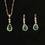 An emerald and diamond cluster drop pendant