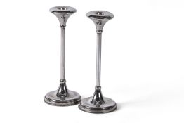 A pair of Greek silver coloured circular candlesticks by M. I. Armaos