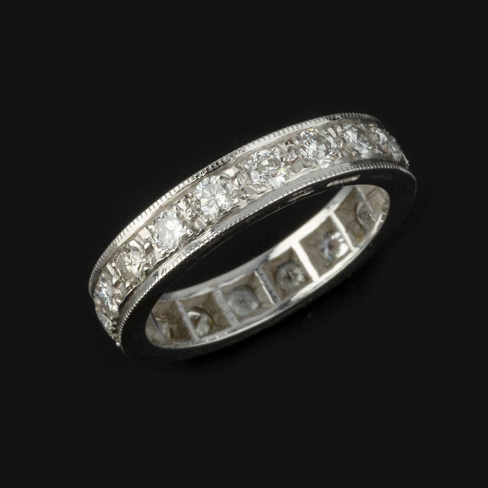 An 18 carat gold eternity ring