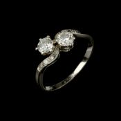 A 1920s diamond two stone crossover ring
